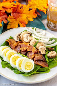 The warm bacon dressing is made from the drippings leftover from cooking the bacon and poured over the spinach, causing slight wilting. Spinach Salad With Warm Bacon Dressing Flavor Mosaic