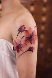 In buddhist symbolism the lotus is symbolic of purity of the body, speech for example, pink flowers express gratitude, and lilacs symbolize first love. Your A Z Guide To Flower Tattoo Meanings Symbolisms And Birth Flowers Tattoo Ideas Artists And Models