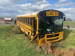 school bus involved in crash near white