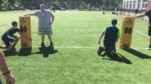 gator roll tackle head behind rugby