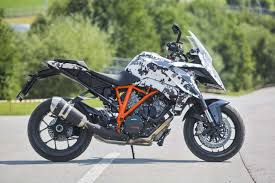 » made from highest grade carbon » extremely light and stiff » installs at the mounting points of the passenger foot pegs » suitable for standard ktm 1290 super duke r special edition 2016. 2016 Ktm 1290 Super Duke Gt Finally Revealed Asphalt Rubber