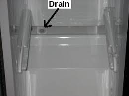 clogged drain causes leaking refrigerators