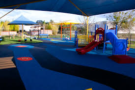 rubber playground surface poured in