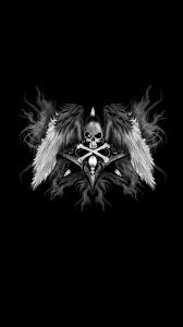 skull and wings on a black background