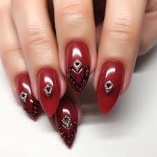 black nail art design with a silver border