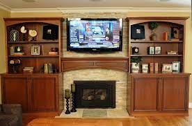 cherry bookcases and fireplace mantel