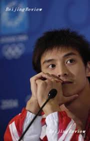 GOLDEN BOY: Tian Liang attends a press conference at the Athens Olympics - 20050126_B37