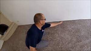 how to restretch carpet you