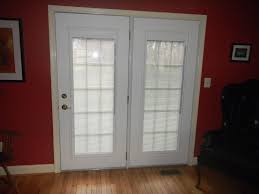 steel entry doors with blinds between