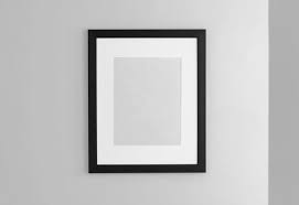black picture frame with pepartout