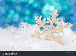 Snowflake On Snow Against Holiday Lights Stock Photo Edit