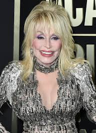 dolly parton sparkles and steals the
