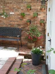 Gallery of our best vertical garden ideas. Garden Brick Wall Design Ideas Windowsunity