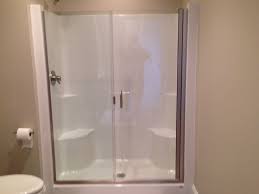 Frameless Shower Door And Panel On A