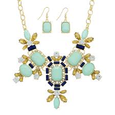 gold tone necklace set featuring mint