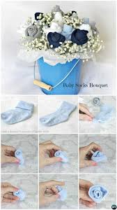 It is a wonderful time to celebrate. Diy Baby Socks Flower Bouquet Handmade Baby Shower Gift Ideas Instructions Handmade Baby Shower Gift Baby Sock Bouquet Baby Socks Flowers