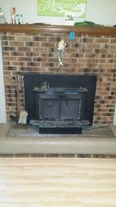 how to install stone over brick fireplace