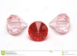 Three Ruby Red And Light Pink Colored Fake Diamonds Stock