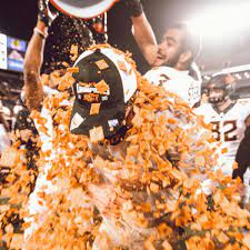 Oklahoma State coach Mike Gundy doused ...