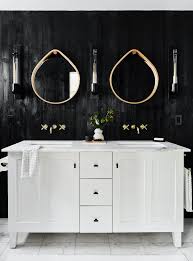 H bathroom vanity in espresso with single basin top in white ceramic and mirror 20 Stunning Black And White Bathrooms That Will Never Go Out Of Style