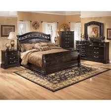 Old world estate bedroom set. The Old World Vision Of The Suzannah Bedroom Collection Takes The Deep Replicated Black Pai Ashley Bedroom Furniture Sets King Bedroom Sets Old World Bedroom