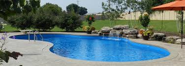 Cheap and simple inground swimming pool. Fort Smith Freeform Pool Builder Springdale Natural Pools