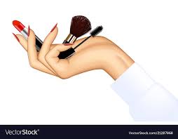 womans hand holding makeup items