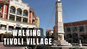 walking tivoli village located in the