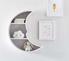 white moon shaped gray wood shelf