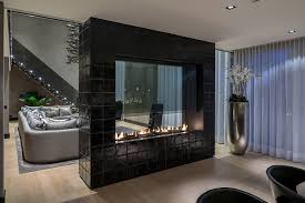 contemporary black tile fireplace