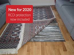 Floor heating systems for carpet. Rugbuddy Under Rug Heater Bewarmer Ltd
