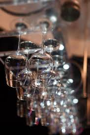 Photo Of Lots Of Wine Glasses Hanging