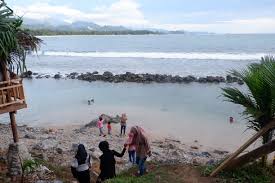 Pantai momong primadona baru wisata lampuuk aceh besar. Pesona Pantai Momong Eksotisme Di Balik Tebing Wisata