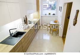 Many people have already become inspired by the solutions that you its a smart space saver for narrow space. Aesthetic Modern Narrow Kitchen With Wooden Furnitures Aesthetic Modern Narrow Kitchen With White Lacquer Furnitures And Canstock