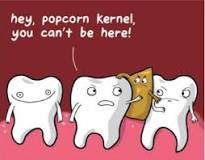 What to Do When a popcorn kernel is stuck in your gum?