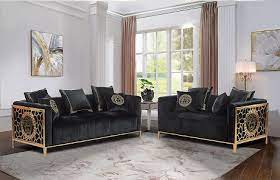 set of sofas black velvet and gold