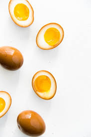 Remove the eggs with the spoon and serve with hot, buttered toast, or allow to cool before peeling. Ramen Eggs Ajitsuke Tamago The Flavor Bender