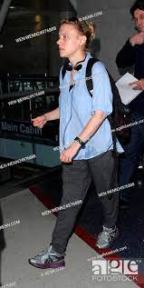 a make up free kate mckinnon arrives at