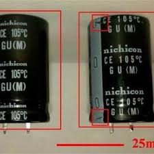 Image Showing The Counterfeit Capacitor On The Right In The