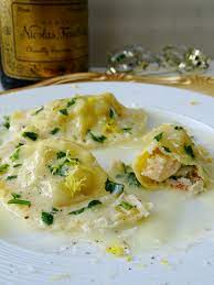 shrimp and lobster ravioli with a