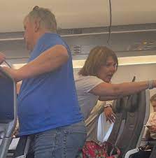 Couple kicked off plane after ...