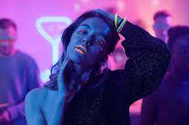 young woman with glamorous neon makeup