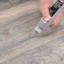 gray wood laminate and vinyl putty