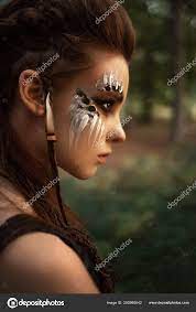 attractive female hunter tribal makeup