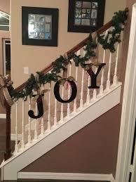 Decorating a banister for the holidays. Revamp On Banister For Christmas This Year Teamlejeune Christmas Staircase Decor Christmas Staircase Christmas Stairs Decorations