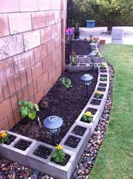 A raised cinder block garden really has so many benefits: How To Use Cement Blocks In Practical Outdoor Projects
