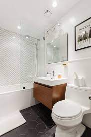 Bathroom remodel bathrooms remodeling small bathrooms with $5,000 or less, seven designers dramatically overhaul seven dreary and outdated bathrooms. What Is The Length Of A Nyc Bathroom Remodel Gallery Kitchen And Bath