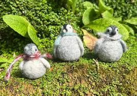 felting work penguins at