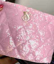 logo s pink sequin cosmetic bag