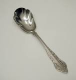 What is the seashell shaped spoon for?
